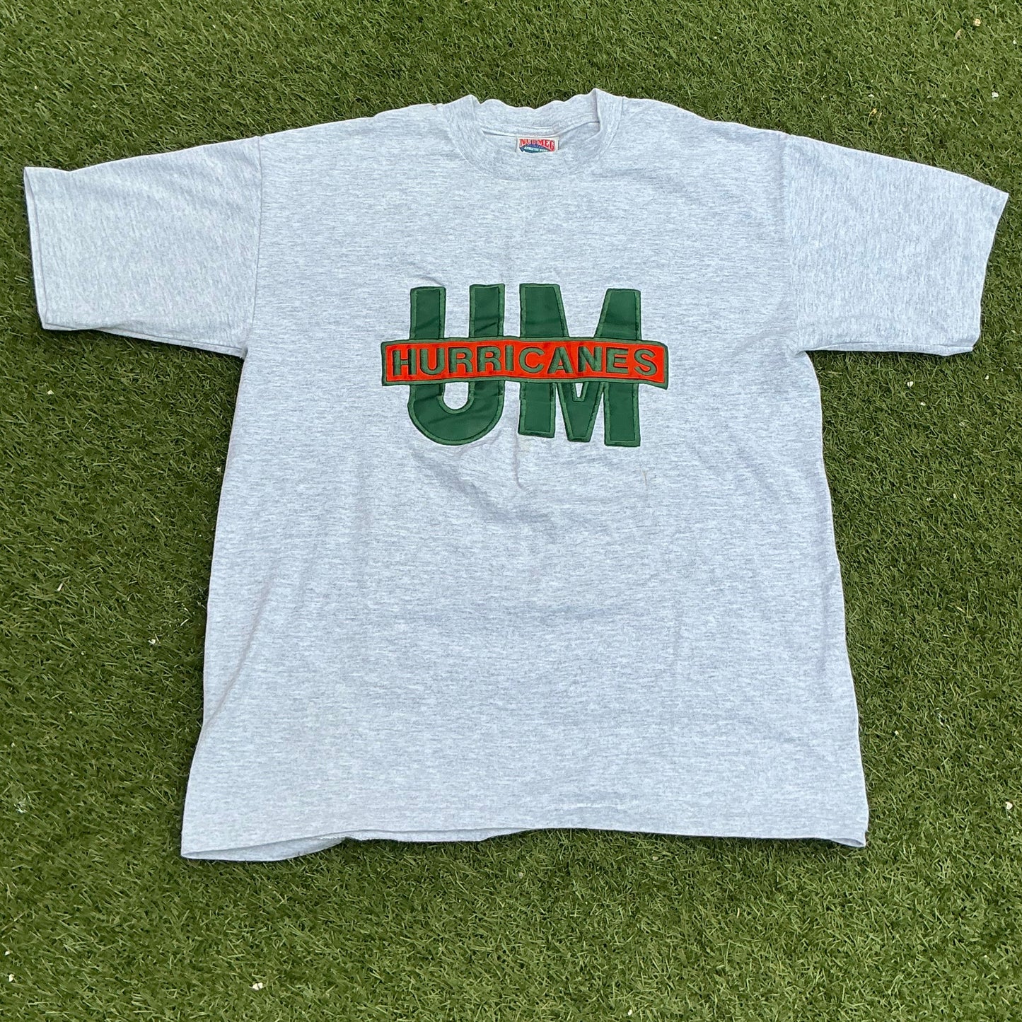 Raised UM Tee - L