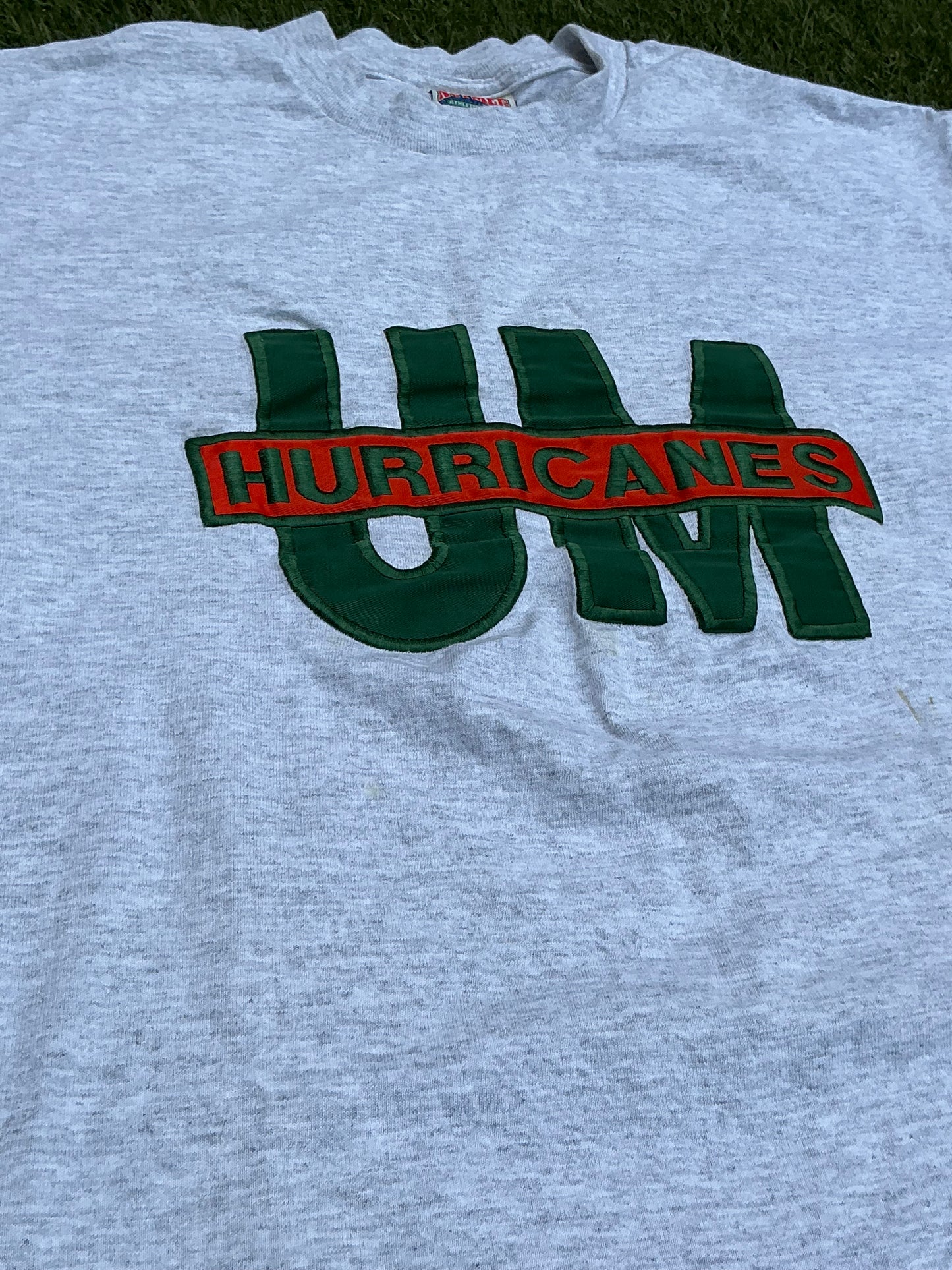Raised UM Tee - L